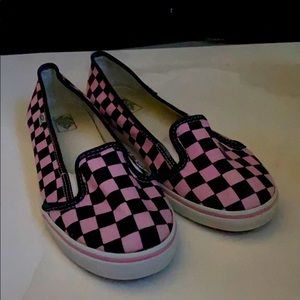 pink and black checkered pattern slip on vans